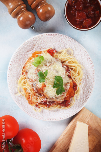 Parmesan chicken with spaghetti pasta photo