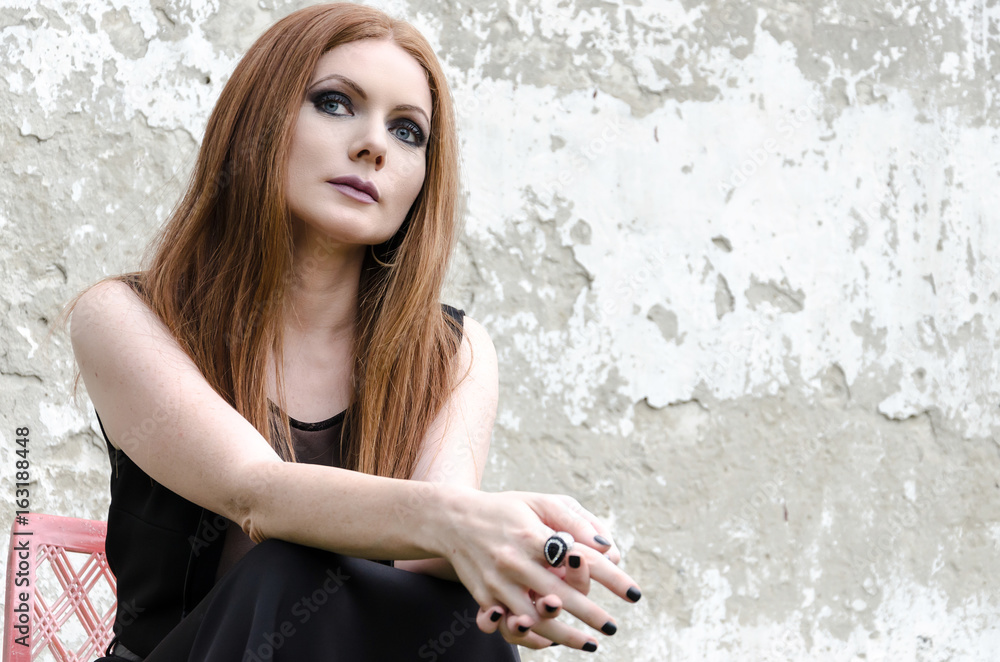 Obraz premium Portrait of beautiful and horrible ginger woman