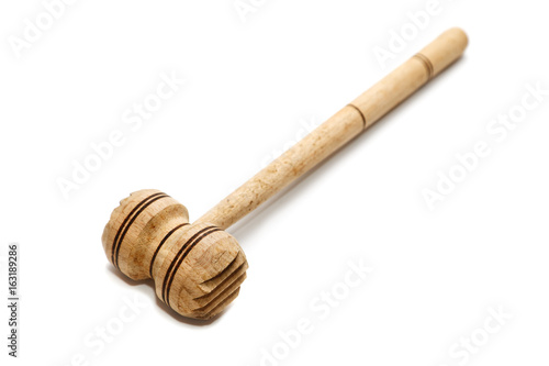Wooden mallet for meat on white background