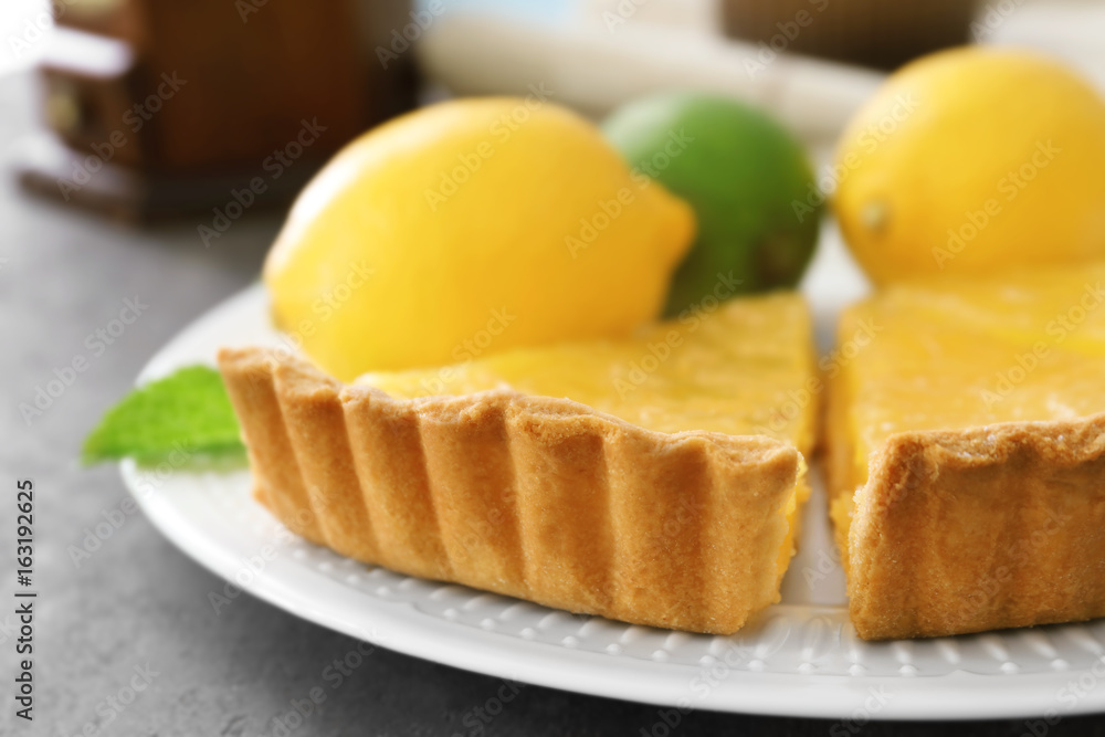 Pieces of homemade lemon tart on plate