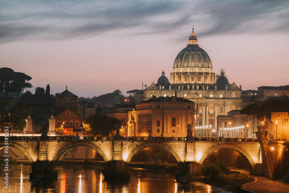 View to bridge and Vatican City at sunset. Rome, Italy