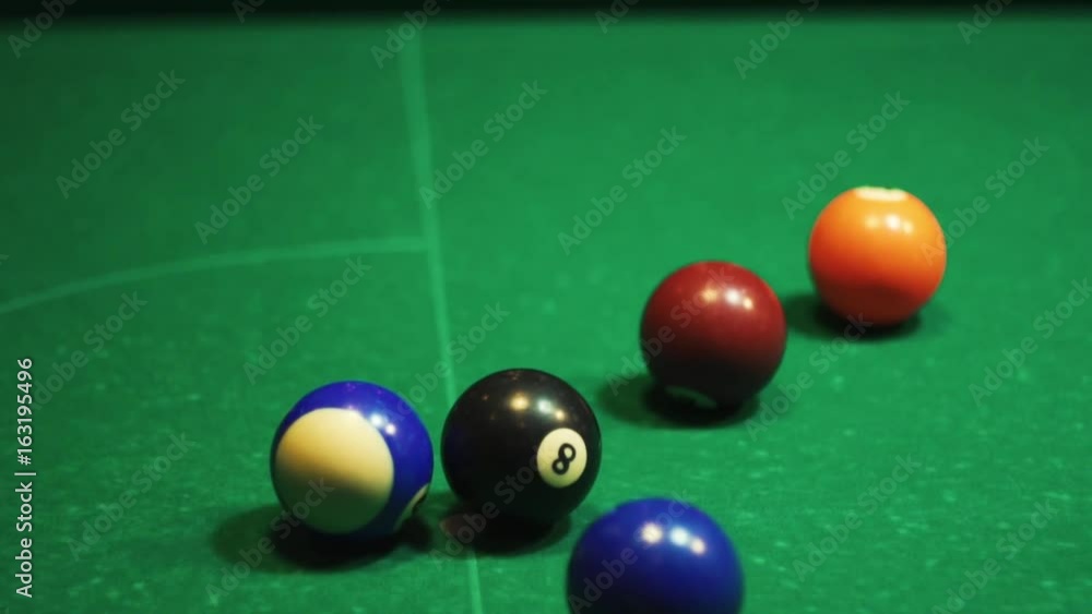 Playing billiards, blowing a cue on the ball, the ball hit the pocket, the ball did not hit the pocket, misfire, hit, American billard, pool, green billiard table, the man plays billiards, breaking Playing billiards, blowing a cue on the ball, the ball hit the pocket, the ball did not hit the pocket, misfire, hit, American billard, pool, green billiard table, the man plays billiards, breaking