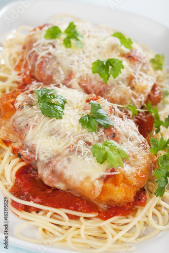 Chicken parmesan with spaghetti pasta photo