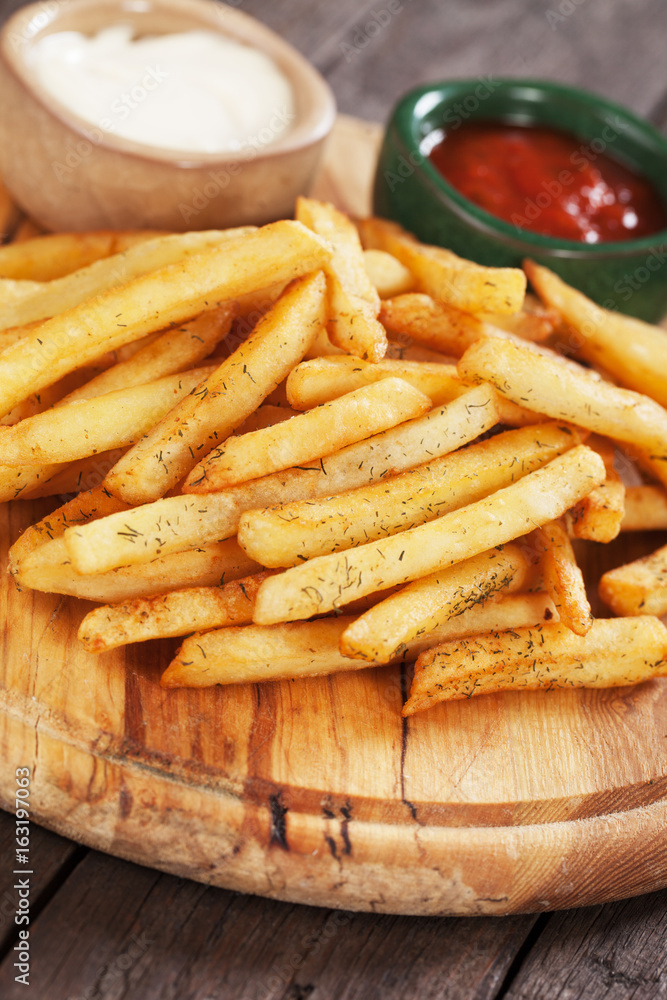 French fries with ketchup and mayonnaise French fries with ketchup and mayonnaise