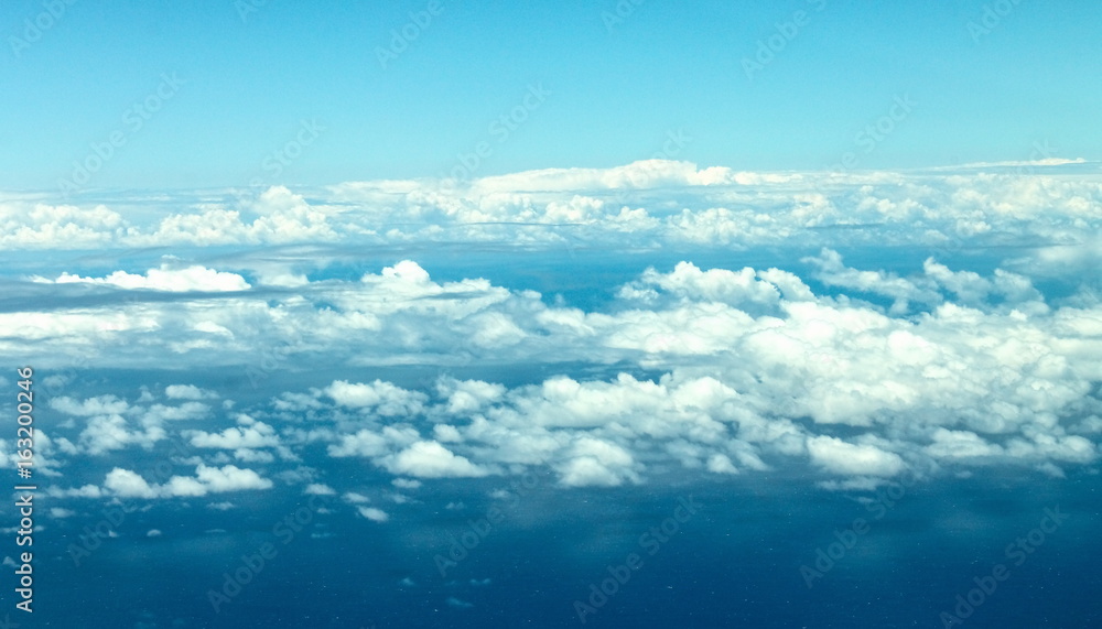 cloudscape taken from above from airplane cloudscape taken from above from airplane