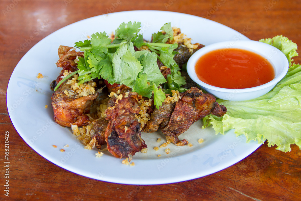 Fried frog in a dish