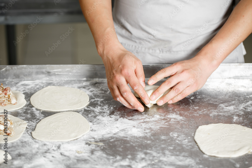 the Baker forms his own hands the billet of dough for baking