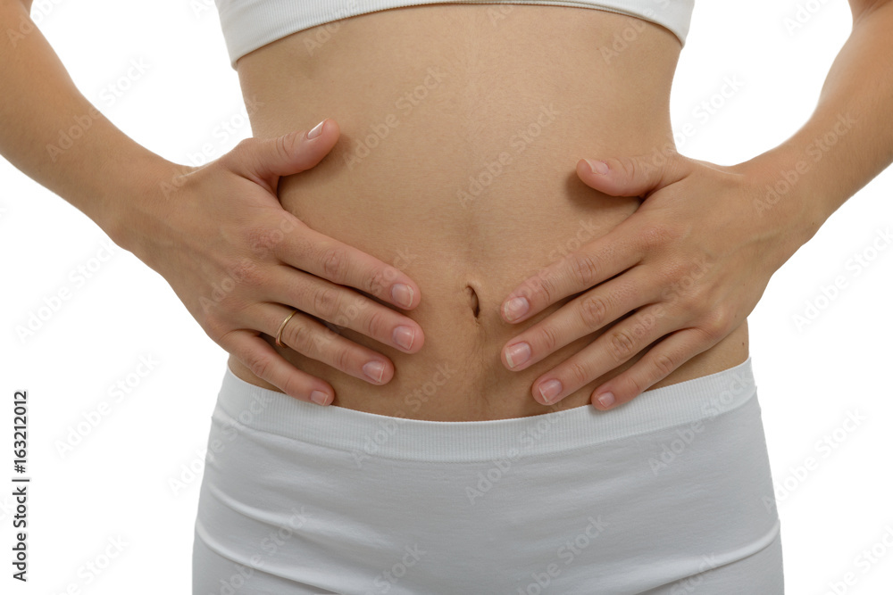 Closeup woman stomach ache with white background Closeup woman stomach ache with white background