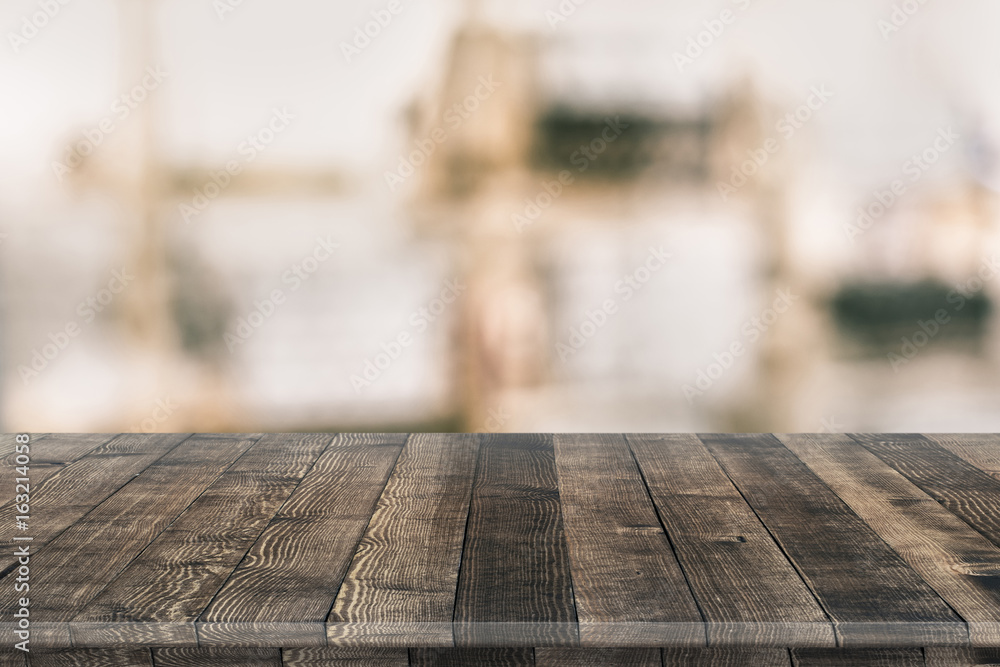 Empty wooden table for product placement or montage with focus to table top in the foreground, with white background. Wooden board empty table perspective. - obrazy, fototapety, plakaty 