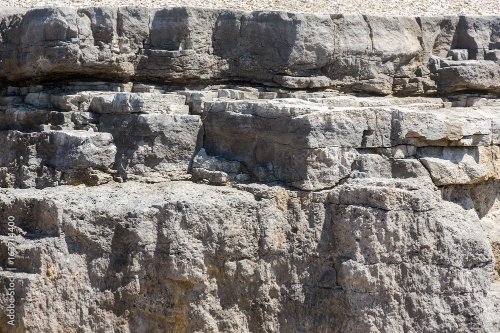Rough rock texture from Isle of Portland rocks Rough rock texture from Isle of Portland rocks