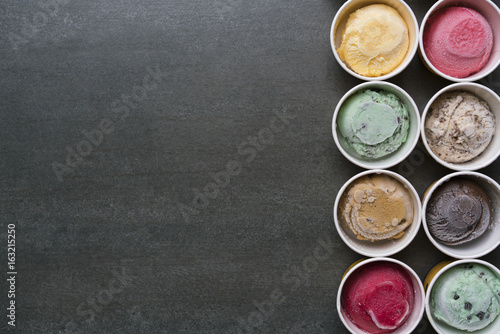 Top view Ice cream flavors in cup on blackground