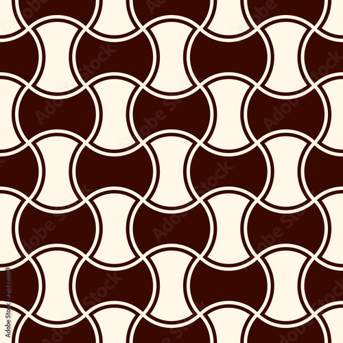 Apple core quilts texture. Bow tie motif. Seamless surface pattern design with interlocking axehead figures.