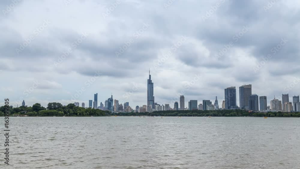 Time lapse of skyline in nanjing city with xuanwu lake,china ,cloudy day Time lapse of skyline in nanjing city with xuanwu lake,china ,cloudy day
