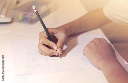 Child writing homework