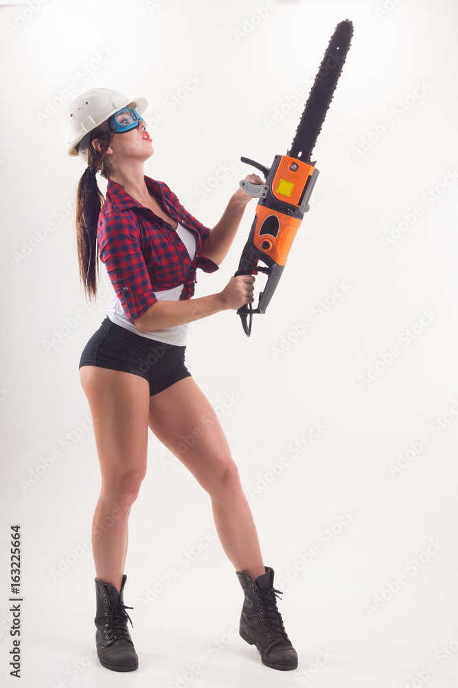 Girl in uniform builder and in helmet Girl in uniform builder and in helmet