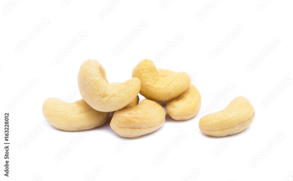 Fototapeta premium Roasted salted cashews isolated on a white background.