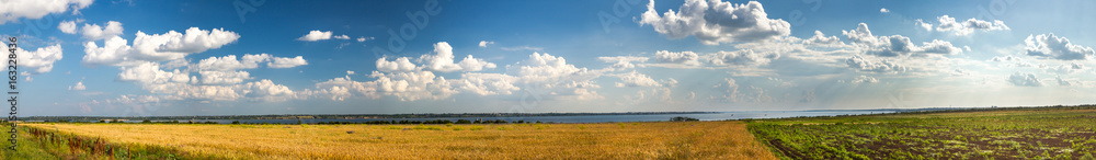 The Dnieper River, fields sown by Ukrainian peasants, a plowed field.