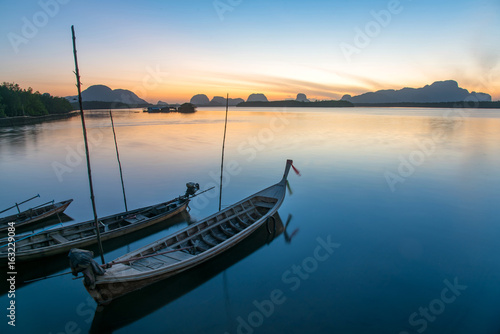 Calm sea and beautiful sunrise at BanSamChongTai, in Phang-nga province, Thailand.