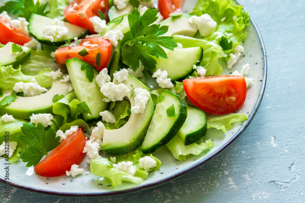 Green salad with avocado and feta Green salad with avocado and feta
