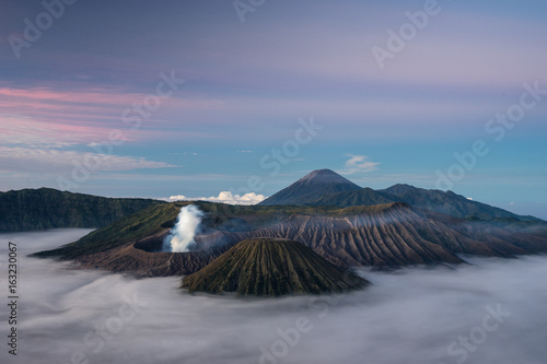 Bromo, Batok, and Semeru volcano mountain in a beautiful morning with sea of mist, Java, Indonesia