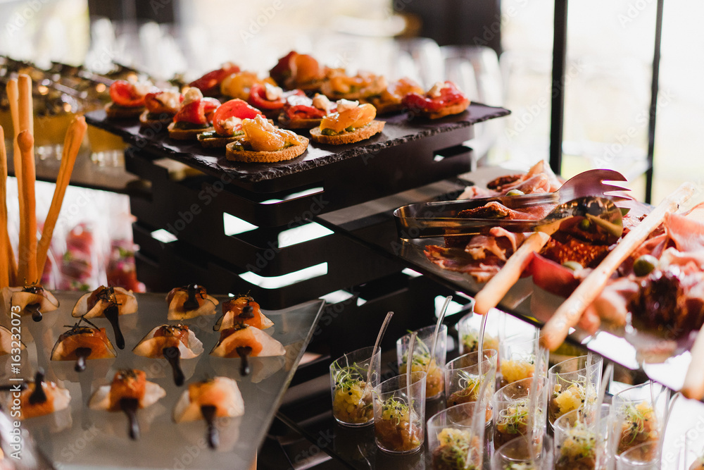 Catering banquet table at reception. Restaurant presentation, molecular  gastronomy, haute cuisine, food consumption, party concept. Photos | Adobe  Stock
