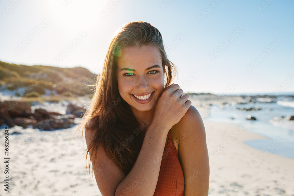 Beautiful smiling bikini woman at sea shore Beautiful smiling bikini woman at sea shore
