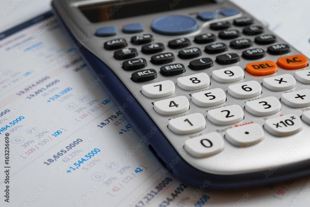 close up advance calculator for engineer or business on the finance/math paper. close up advance calculator for engineer or business on the finance/math paper.