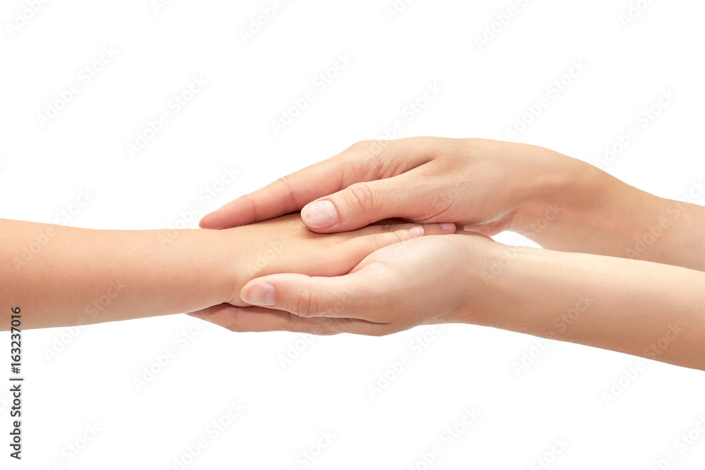 hand of young girl holding kids hand. Isolated on white background