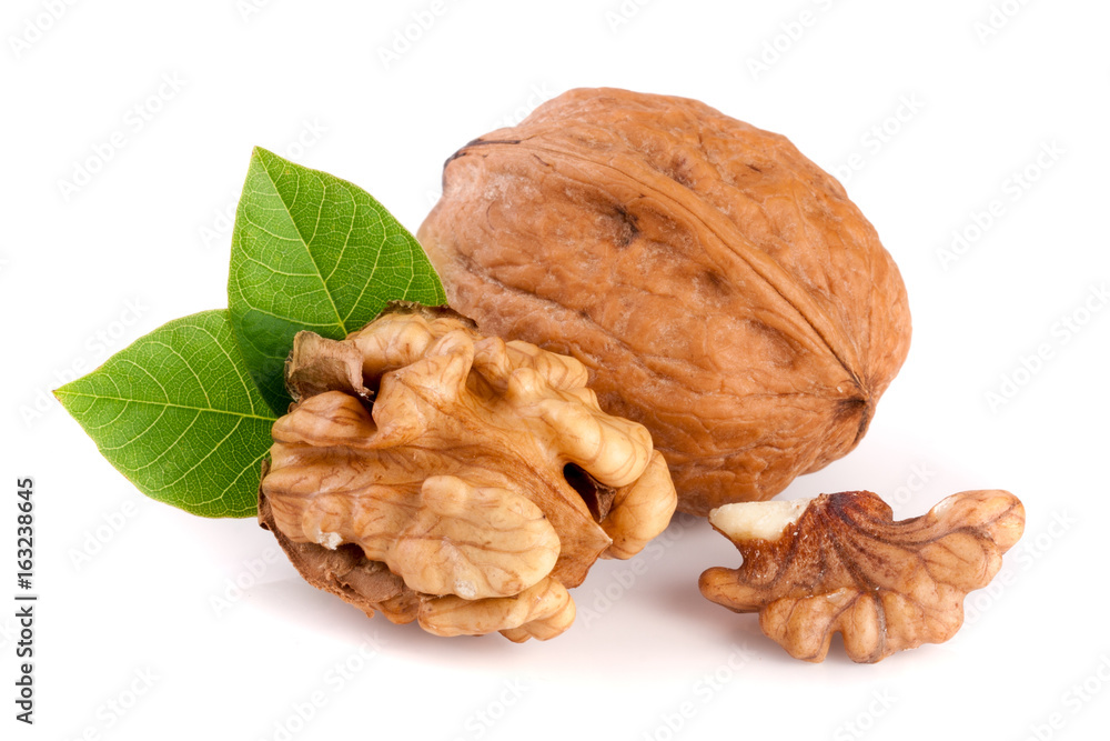 Walnuts with leaf isolated on white background Walnuts with leaf isolated on white background