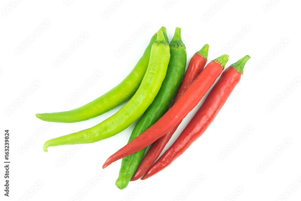 green and red chili pepper on a white background