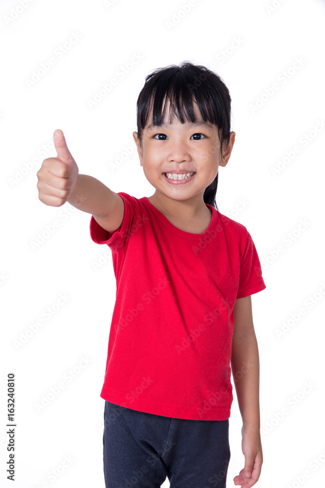 Asian Chinese little girl showing thumbs up Asian Chinese little girl showing thumbs up