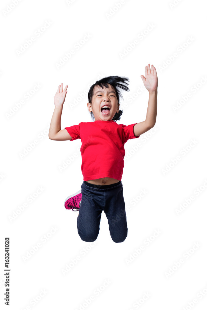 Asian Chinese little girl jumping up and wave her hands Asian Chinese little girl jumping up and wave her hands