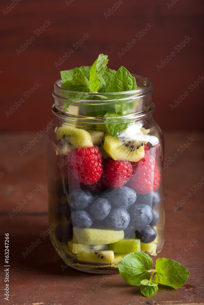 fruit salad in mason jar strawberry blueberry kiwi apple mint fruit salad in mason jar strawberry blueberry kiwi apple mint