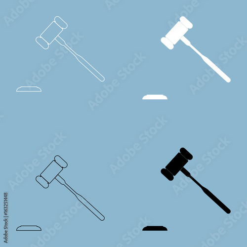 The judicial hammer  the black and white color icon .