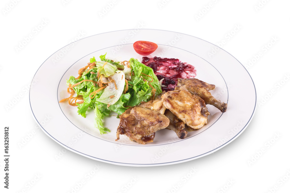 Salad with quail legs, greens on a plate on a white background