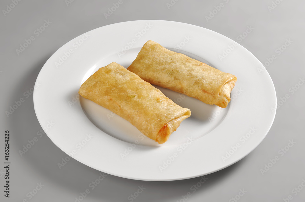Round dish with dim sum spring rolls Round dish with dim sum spring rolls