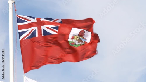 Bermudian flag waving in Bermuda. photo