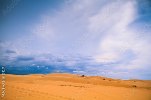 White Desert At Mui Ne/ / Sunny Day With Blue Sky And Clouds On Sand Dune (White Desert) At Mui Ne Vietnam.