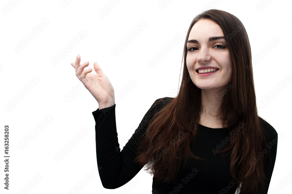 Half-length portrait of beautiful smiling woman with long hair and brown eyes in black blouse pointing up with blank text space, isolated on white. Half-length portrait of beautiful smiling woman with long hair and brown eyes in black blouse pointing up with blank text space, isolated on white.