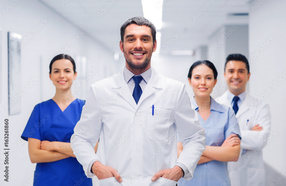 happy group of medics or doctors at hospital happy group of medics or doctors at hospital
