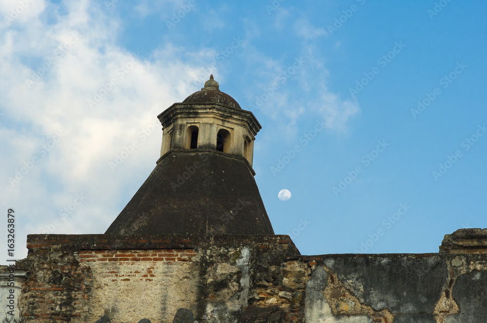 View dome of colonial houses in Antigua Guatemala and moon. View dome of colonial houses in Antigua Guatemala and moon.