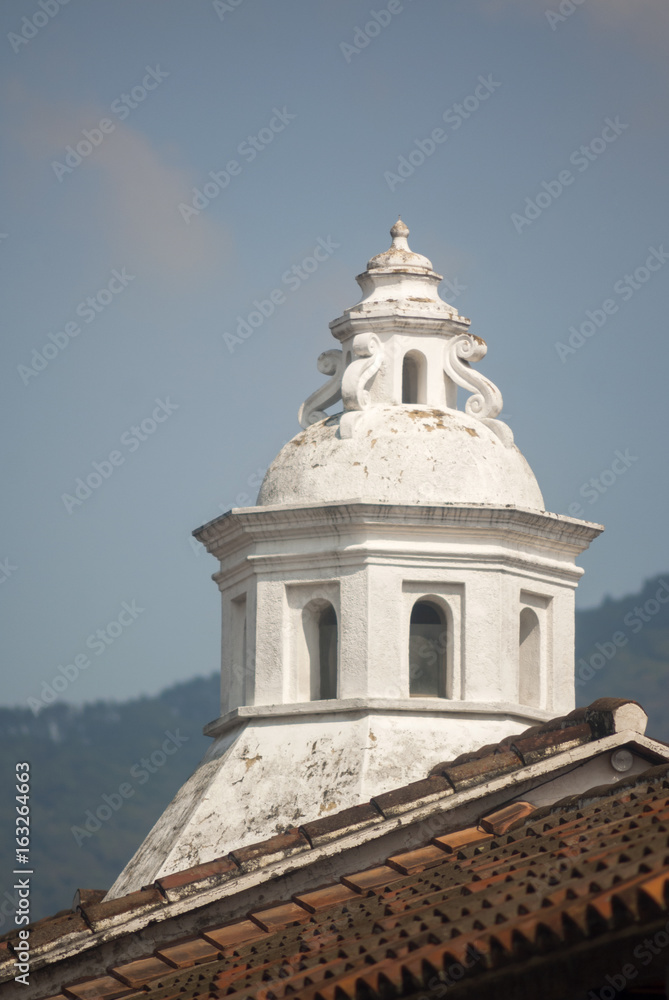 Fototapeta premium Exterior detail of house in La Antigua Guatemala, wall and cupula colonial style in Guatemala, Central America.