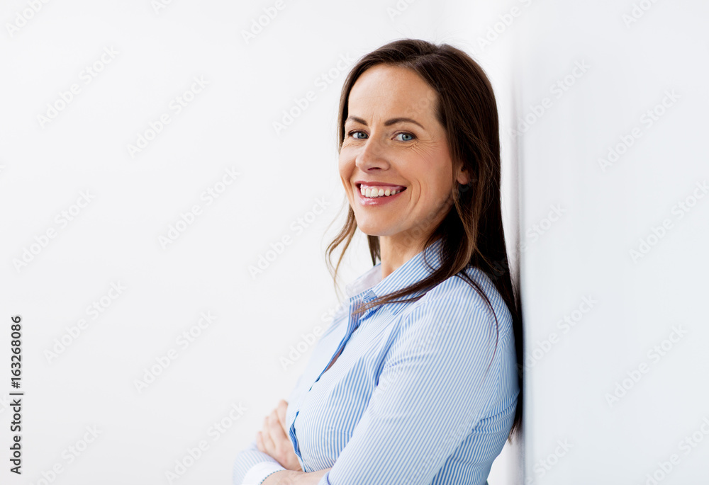 happy smiling middle aged woman at office happy smiling middle aged woman at office
