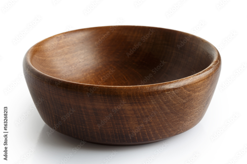 Empty dark wooden bowl isolated on white. Empty dark wooden bowl isolated on white.
