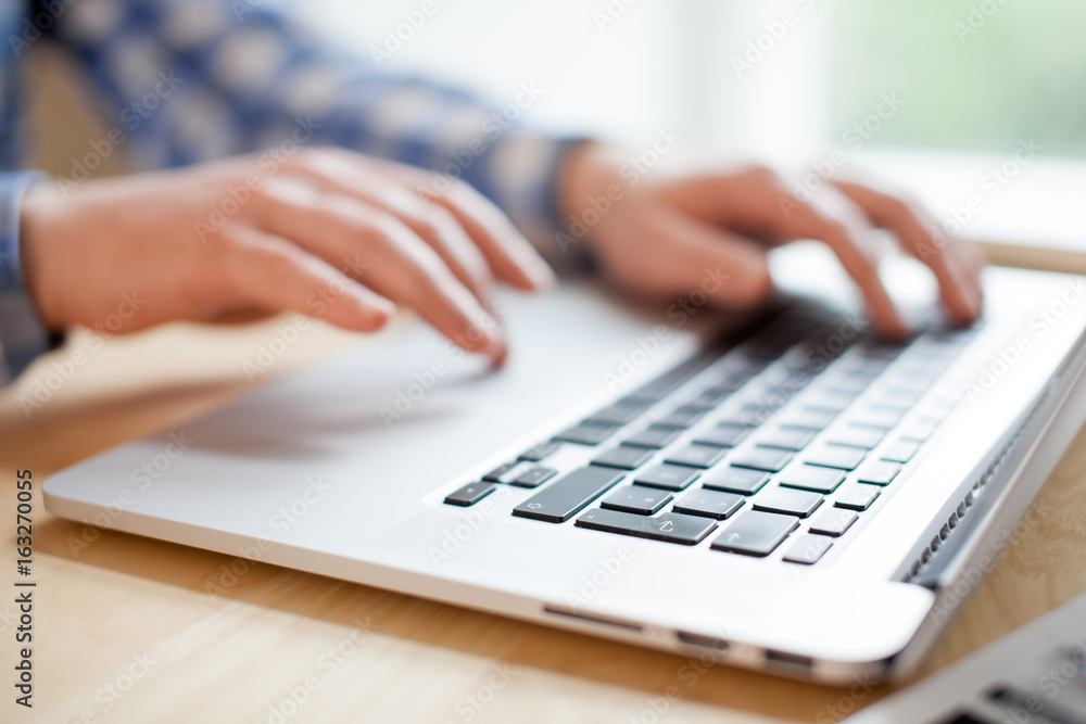 hands with laptop typing hands with laptop typing