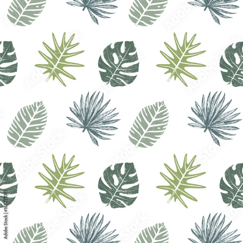 Seamless pattern with hand drawn tropical leaves