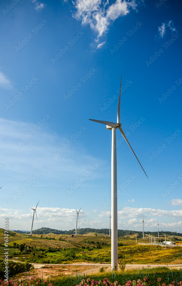 wind turbine against blue sky wind turbine against blue sky