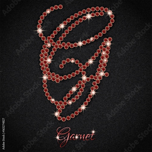 Calligraphic letter G from realistic crystals with sparkles of precious stone Garnet on black denim background. Vector illustration
