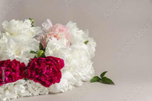 Luxury bouquet of peonies. Gorgeous flowers for the bride's bouquet. Template for design. Copy space.
