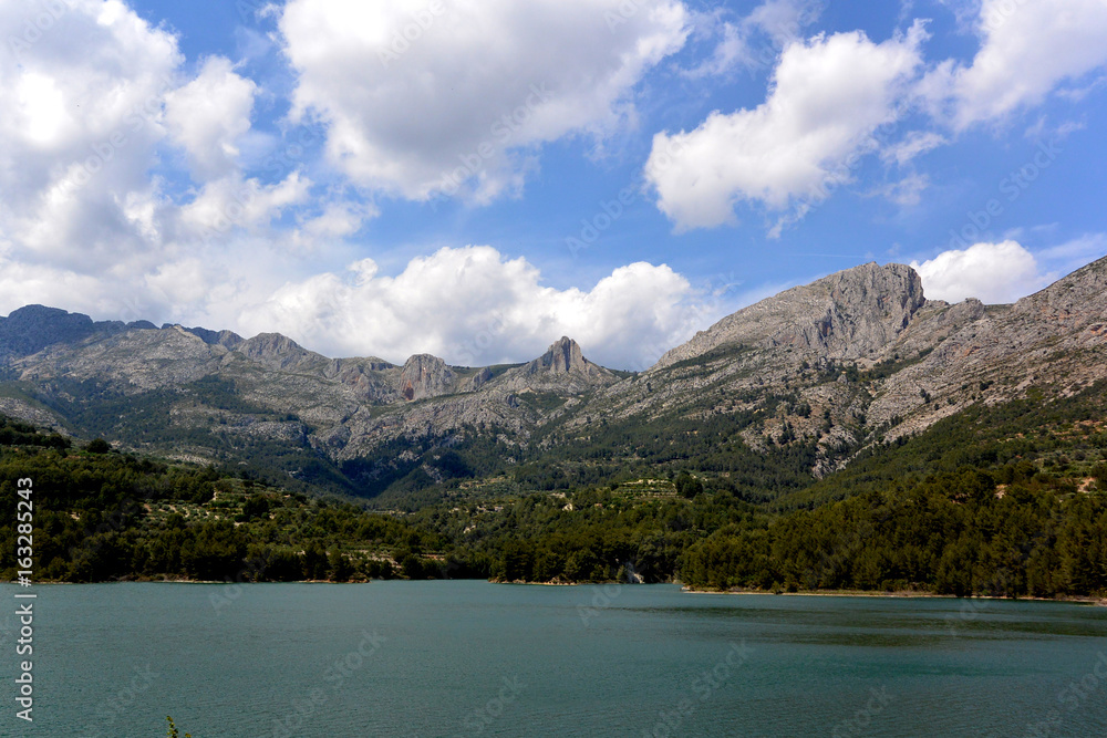 spanish  reservoir of Guadalest, an enlarged natural or artificial lake, storage pond or impoundment 